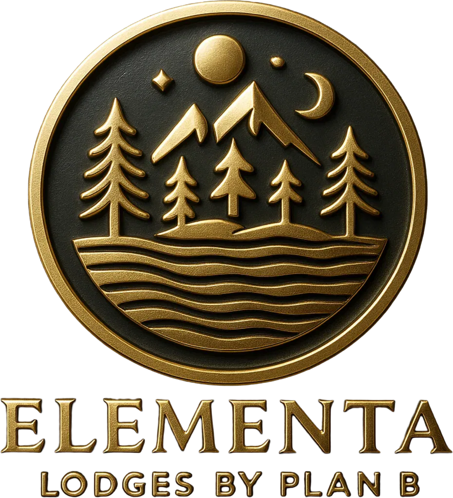 Goldenes Emblem mit Bäumen und Bergen